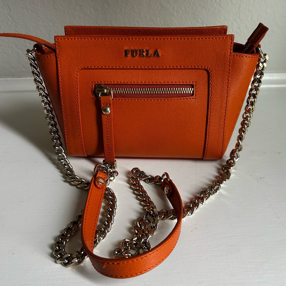 Furla tangerine orange crossbody handbag.